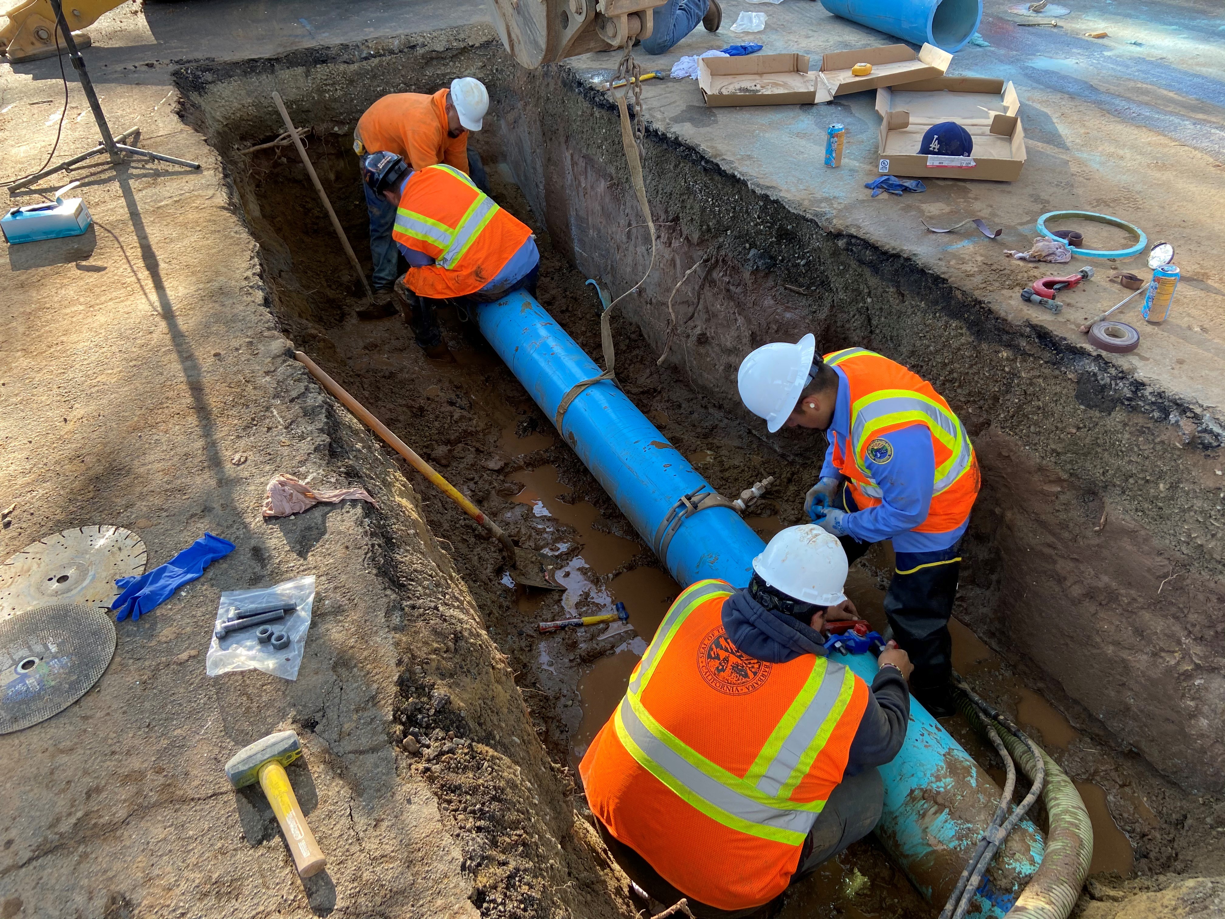 City staff repairing water main break.