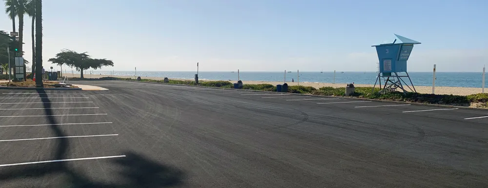 Parking lot beach and lifeguard tower