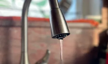 Kitchen faucet running water